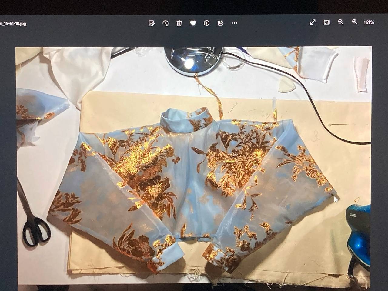 Printed bodice piece in progress on the worktable