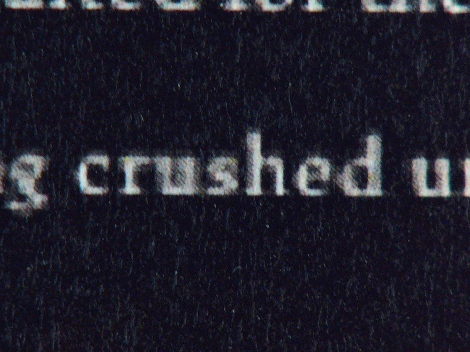 Dark page with white text about being crushed under a foot