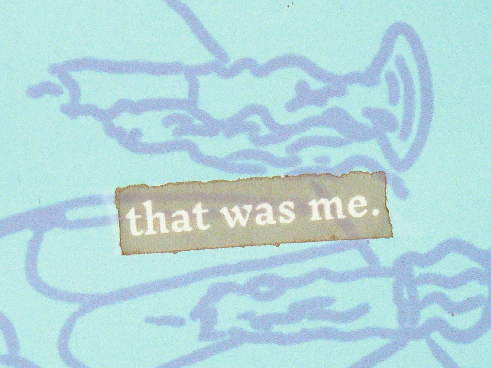 Torn fragment reading that was me on a pale blue illustrated page