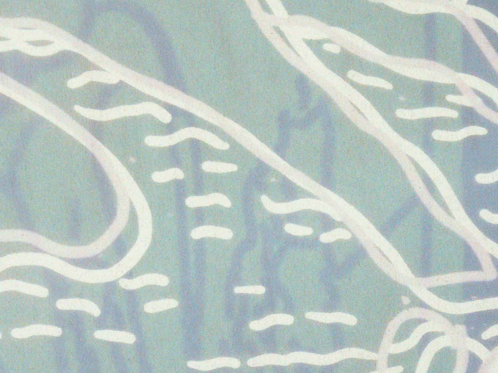 Ochre and green page with hand-drawn wave lines