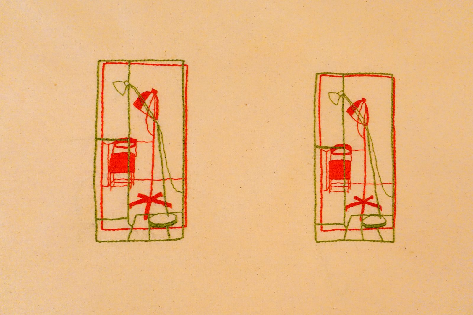 Pair of small green and red stitched drawings side by side